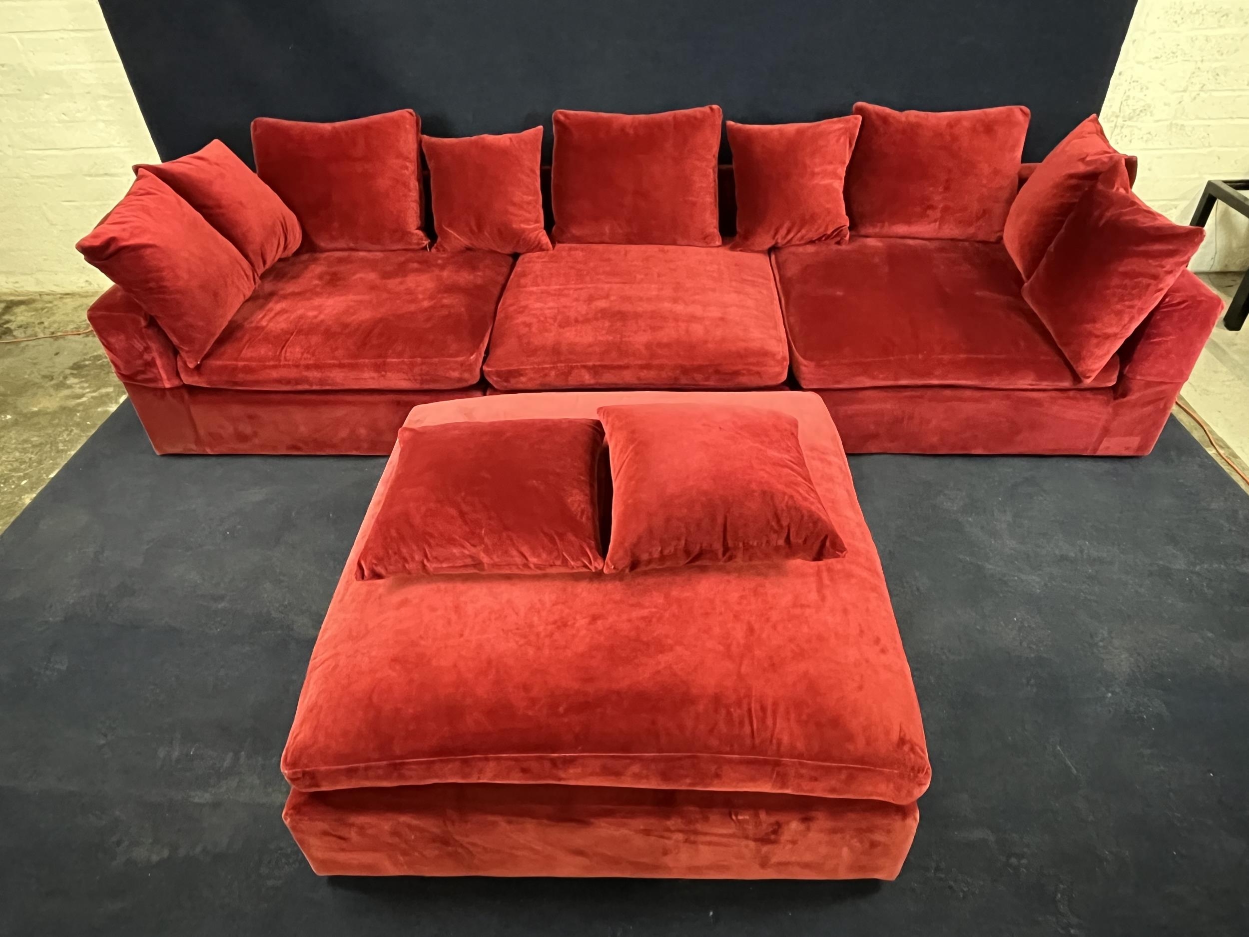 A large modern sofa in red upholstery, with a matching stool. H.60 W.330 in three parts D.120.cm - Image 2 of 5