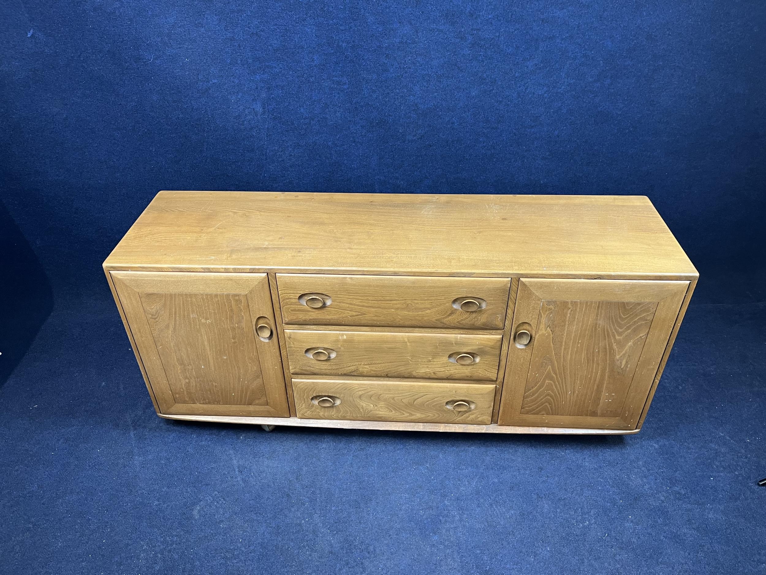 An Ercol elm sideboard. H.70 W.157 D.44.cm - Image 2 of 5