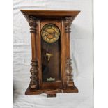 An early 20th century German DRGM oak wall clock