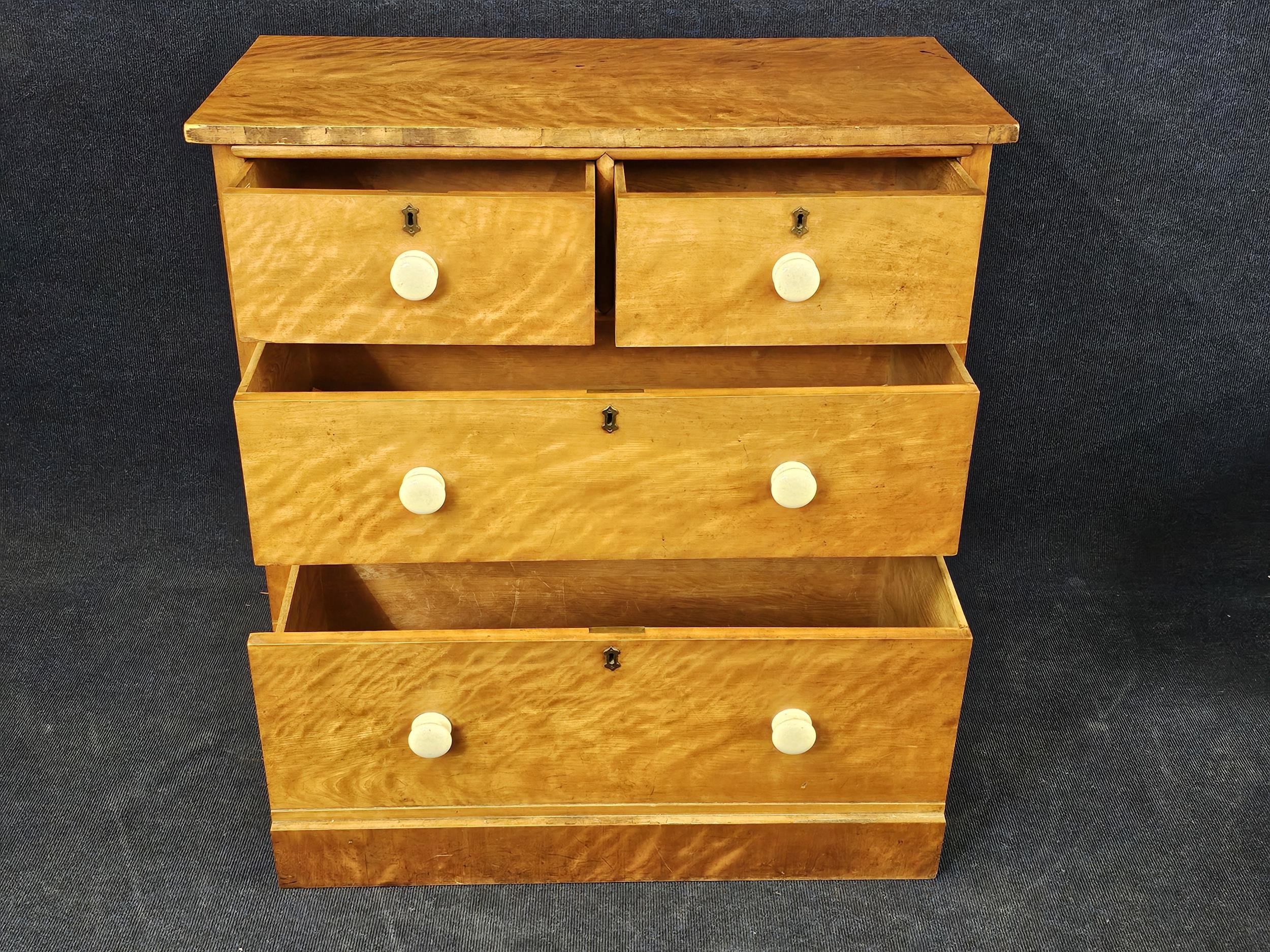A Victorian satinwood chest of drawers. H. 91 W.96 D.49cm. - Image 3 of 6