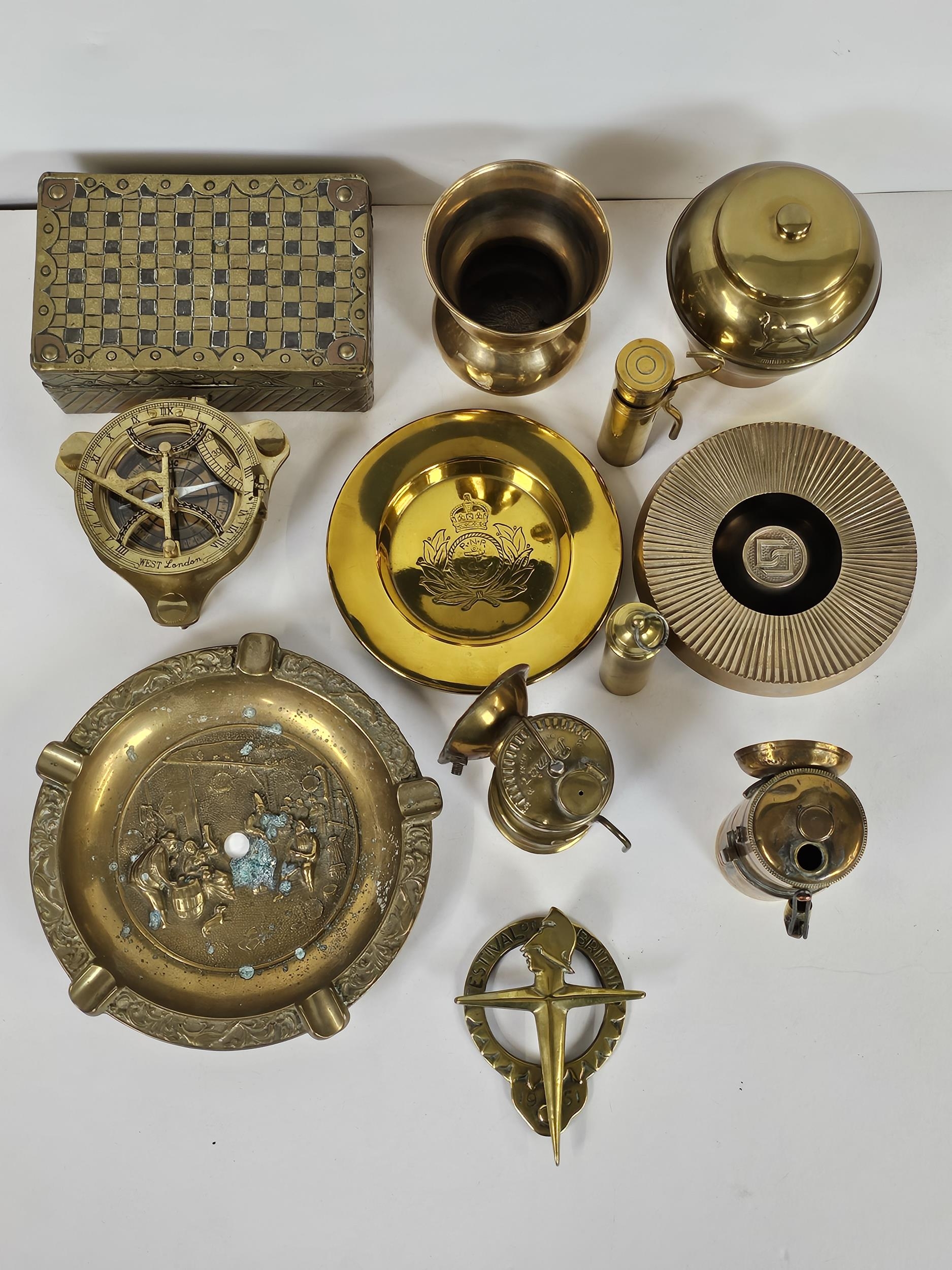 Large quantity of brass items including a Lipton British Empire Exhibition tea caddy and a desk