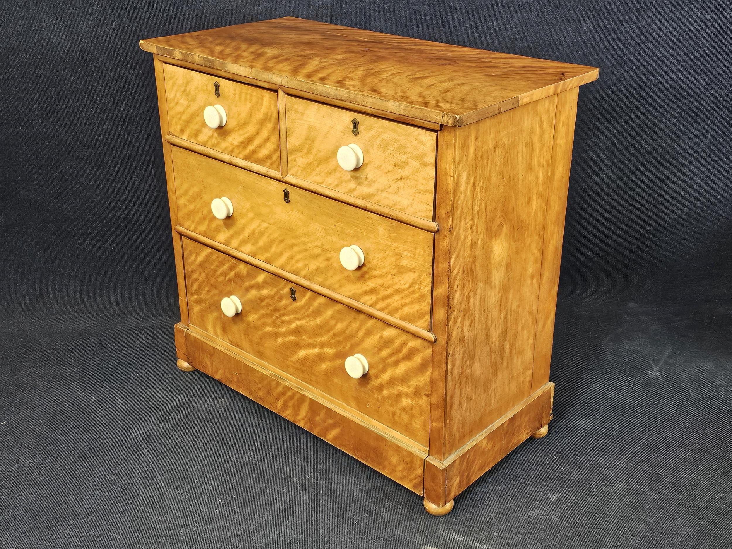 A Victorian satinwood chest of drawers. H. 91 W.96 D.49cm. - Image 4 of 6