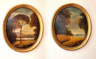 Two gilt framed oval oils on board depicting lake views, signed C.Moraldi. H.34 W.29cm