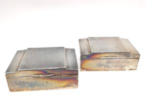 A pair of 1940s silver cedar lined engine turn decorated cigarette boxes by Walker & Hall, each with