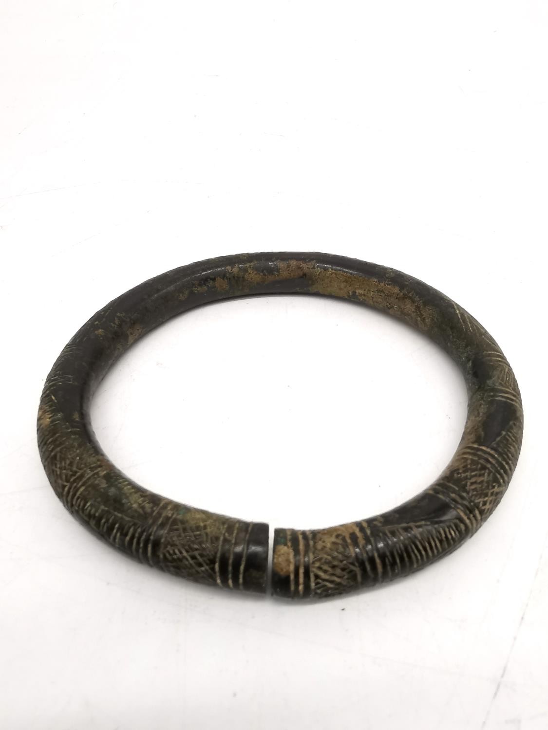 An ancient Iranian bronze torque arm bracelet/necklace with incised design. Diameter 12cm, - Image 3 of 6