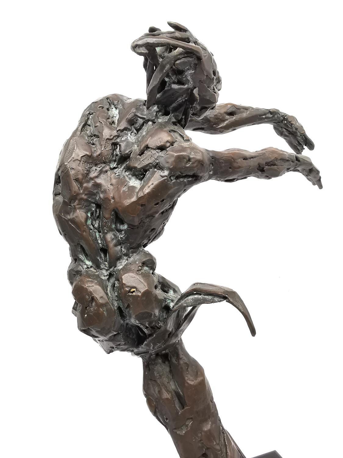 Samantha Keil, British, 20th Century, a stylised bronze figure of a leaning dancer with arms out - Image 5 of 10