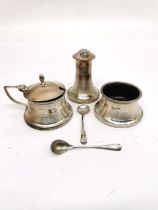 A silver cruet set with engine turned detailing by J Collyer & Co Ltd, including pepper shaker,