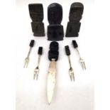 A collection of Mexican silver and gold sheen obsidian pieces, including a knife, set of four