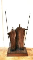 Wim De Roubaix, South African artist, large bronze sculpture of two robed figures holding spears