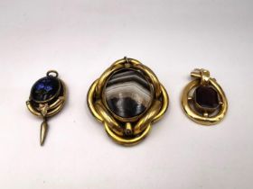 A collection of Victorian rolled gold jewellery, including a rolled gold swivel brooch/pendant,