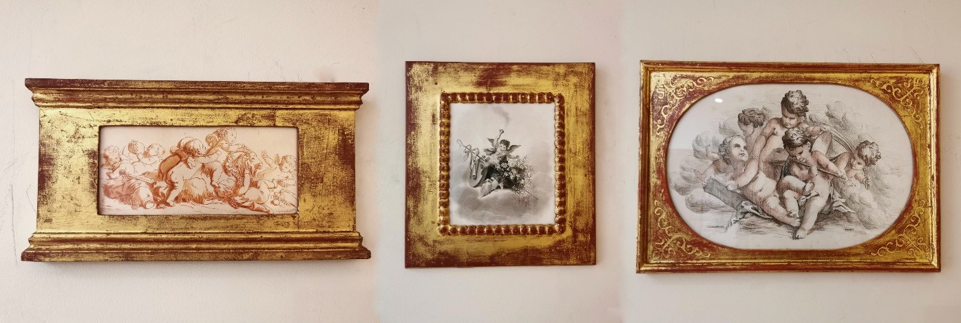 Three gilt framed and glazed 19th century engravings of putti, one sanguine. Gallery label verso.