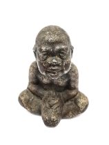 An early 20th century silvered bronze seated buddha in lotus position. H.12cm