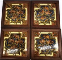 Four framed 19th century glazed hand painted tiles by W B Simpson & Sons, depicting chrysanthemums