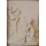 A moulded gold framed composite marble relief plaque of putti by 'P J Seymour', with bronze medal