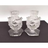 A pair of Lalique molded and frosted glass "Mesanges" candle holders, modeled as pairs of birds