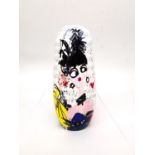 Lanvin, Paris, a set of Matryoshka dolls each hand painted with a different design. Makers mark to