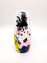 Lanvin, Paris, a set of Matryoshka dolls each hand painted with a different design. Makers mark to
