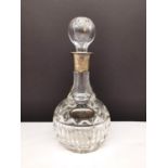 A Mappin & Webb cut crystal decanter with silver collar and EPNS 'Gin' label. (hair line crack to