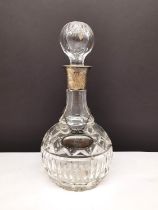 A Mappin & Webb cut crystal decanter with silver collar and EPNS 'Gin' label. (hair line crack to