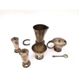 A white metal middle eastern cruet set, comprising a hinged mustard pot with spoon, sugar bowl,