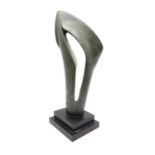 An abstract bronze effect resin sculpture on stepped base. H.41 W.16 D.14cm.