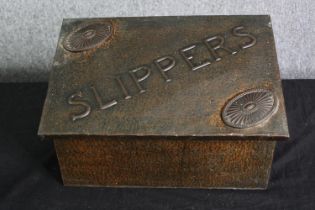An early 20th century hammered copper slipper box. H.23 W.38 D.21cm.