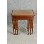 A nest of three mahogany tables with leather and glass inset tops H.58 W.53 D.40cm. (largest).