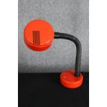 A vintage 1970's Hanimex red plastic reading lamp. H.61cm.