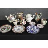 A group of various Staffordshire porcelain tea pots, jugs and plates. H.21cm. (largest).