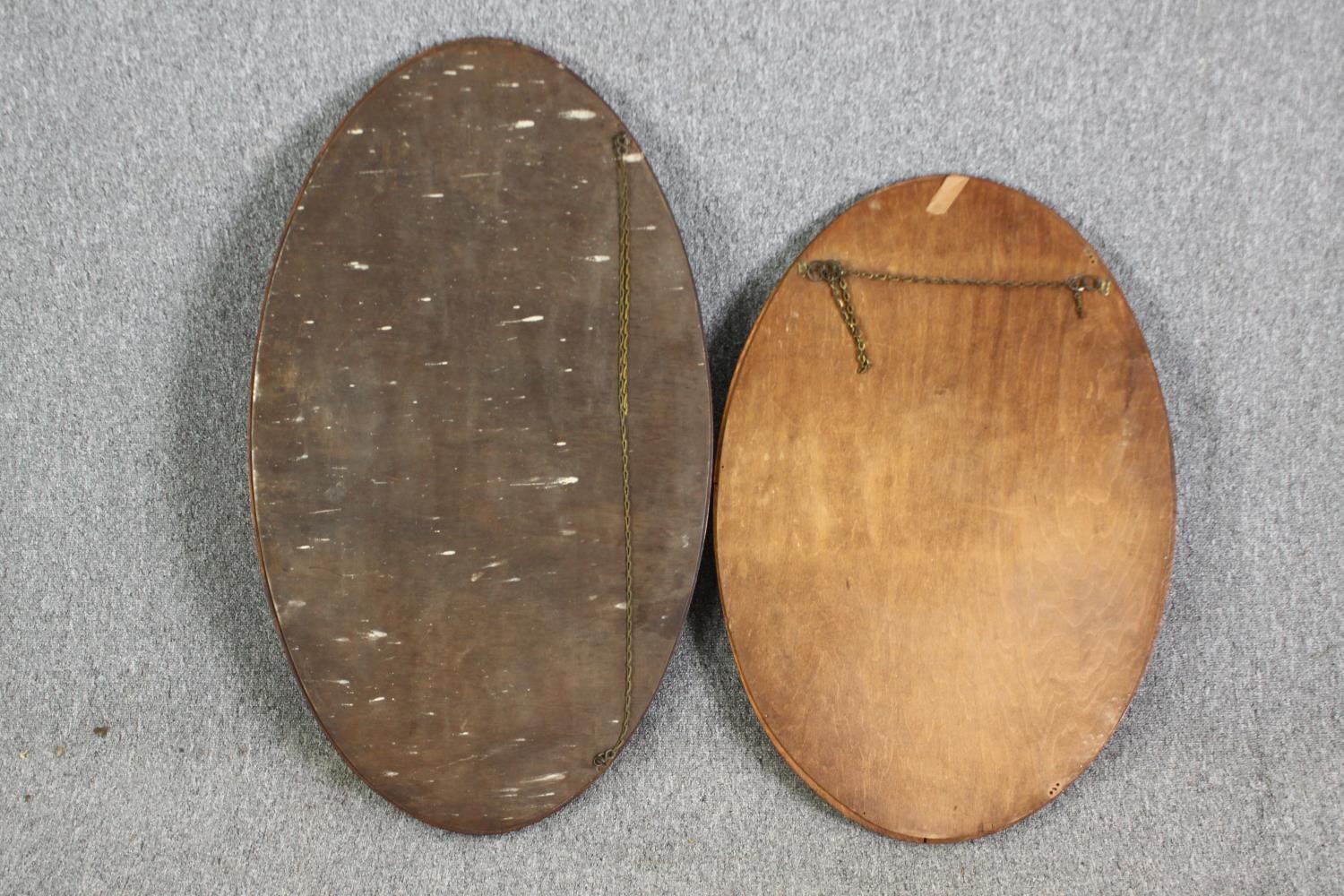 Two oval mirrors, one in oak, the other walnut, with bevelled glass H.95 W.55cm. - Image 6 of 8