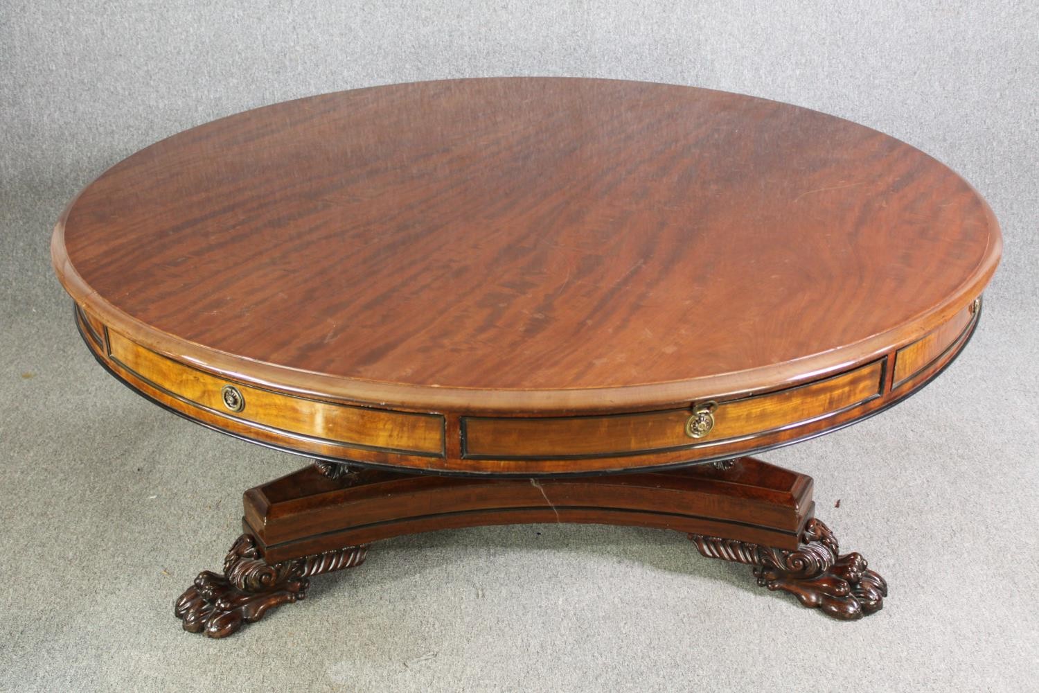 A late Regency style mahogany drum top dining or centre table, bearing a Waring & Gillows - Image 4 of 16
