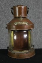 A Masthead copper and glass ship's lantern. H.31cm.