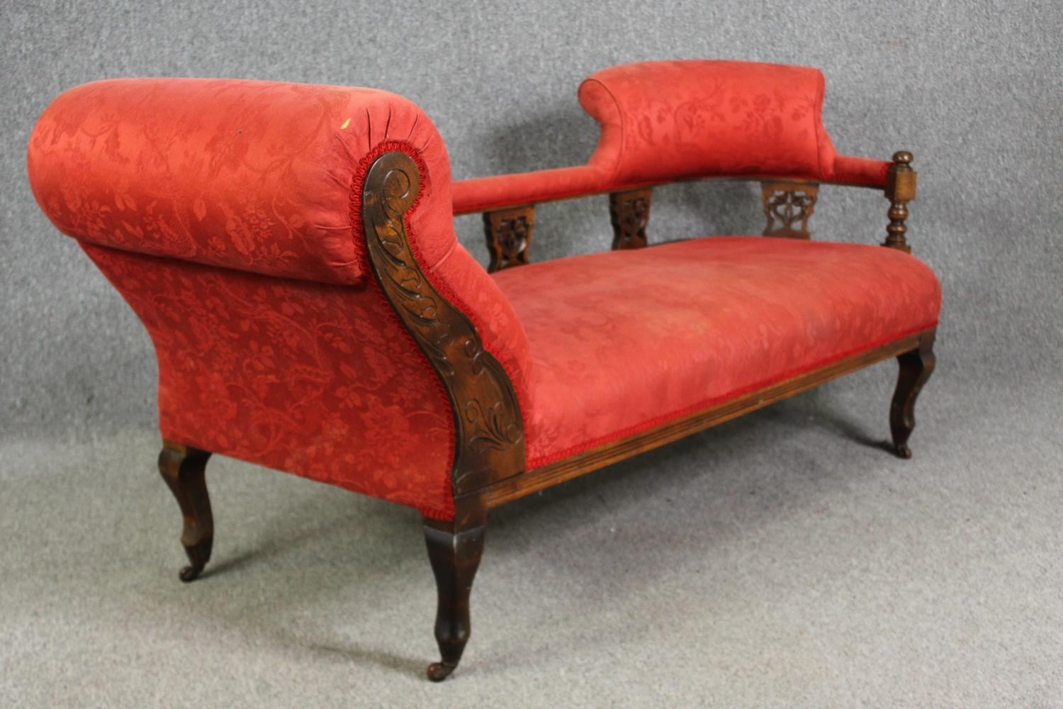 A late Victorian carved walnut chaise longue, with red damask upholstery, H.78 W.180 D.53cm. - Image 5 of 7