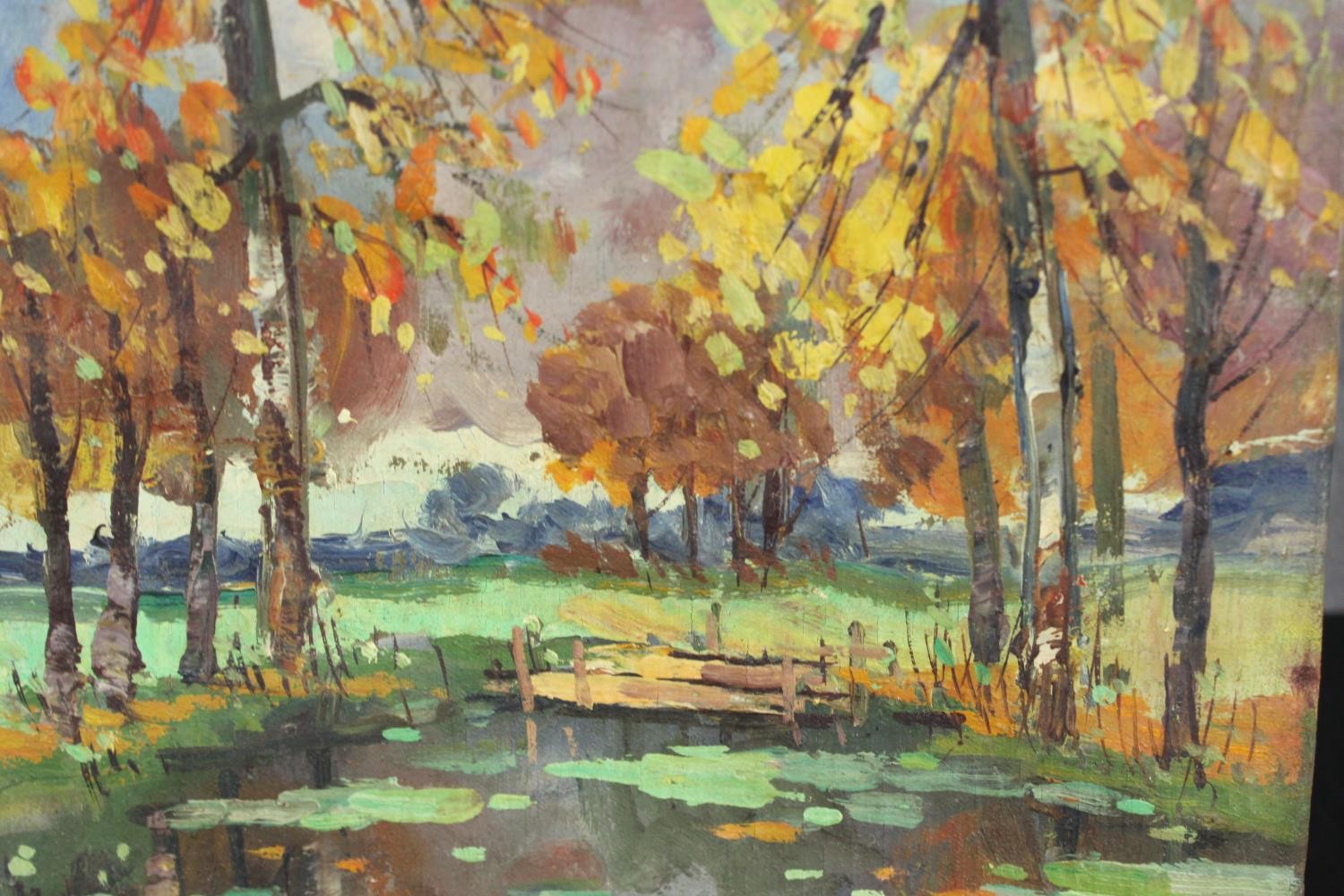 Leopold Lecomte, an Impressionist style oil on canvas of an autumnal woodland with pond, signed. H.