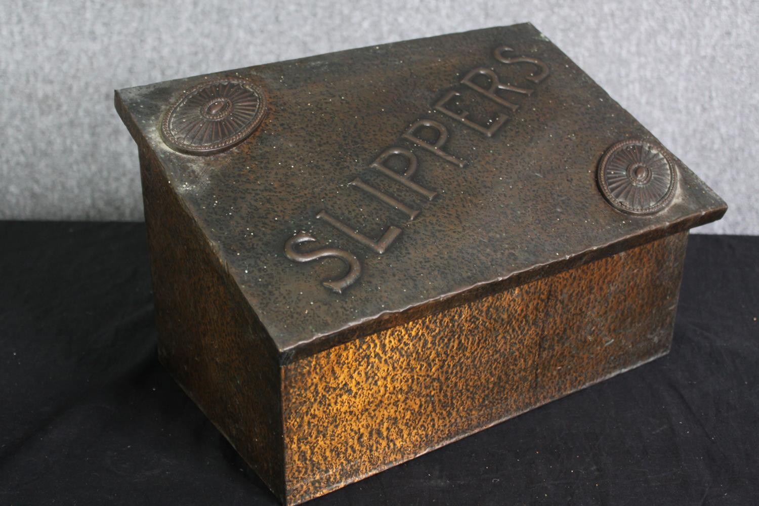 An early 20th century hammered copper slipper box. H.23 W.38 D.21cm. - Image 4 of 5