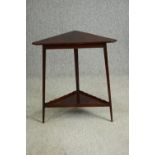 A 19th century mahogany corner table. H.75 W.69 D.37cm.