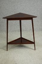 A 19th century mahogany corner table. H.75 W.69 D.37cm.