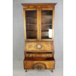 A Queen Anne style walnut and oak bureau bookcase, first quarter 20th century. H.214 W.92 D.50cm.