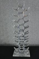 A Michael Noll designed aluminium wine rack. H.101 W.34 D.20cm.