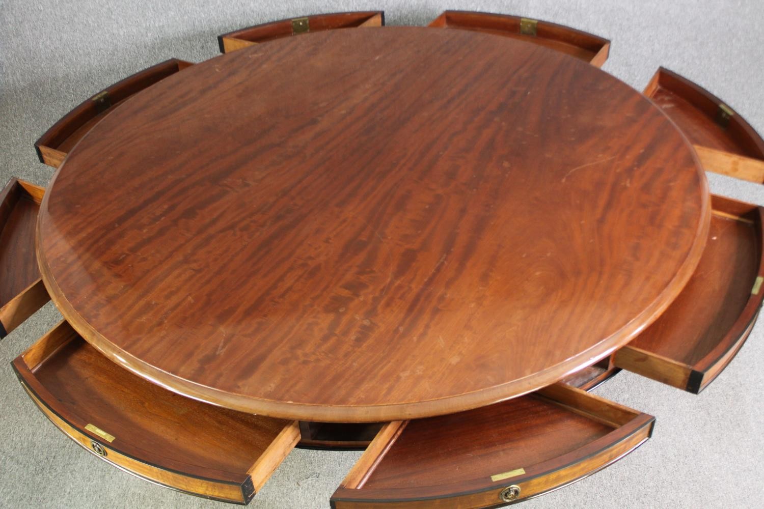 A late Regency style mahogany drum top dining or centre table, bearing a Waring & Gillows - Image 9 of 16