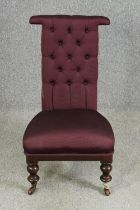 A Victorian mahogany prie dieu chair with modern aubergine textured upholstery. H.96cm.