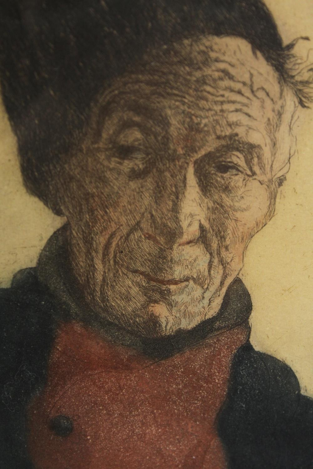 Etching of an elderly man, indistinctly signed and numbered, within an ebonized frame, H.39 W.31cm.