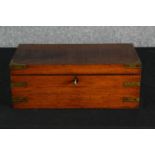 A Victorian mahogany and brass mounted writing slope, with a red leather fitted interior. H.18 W.