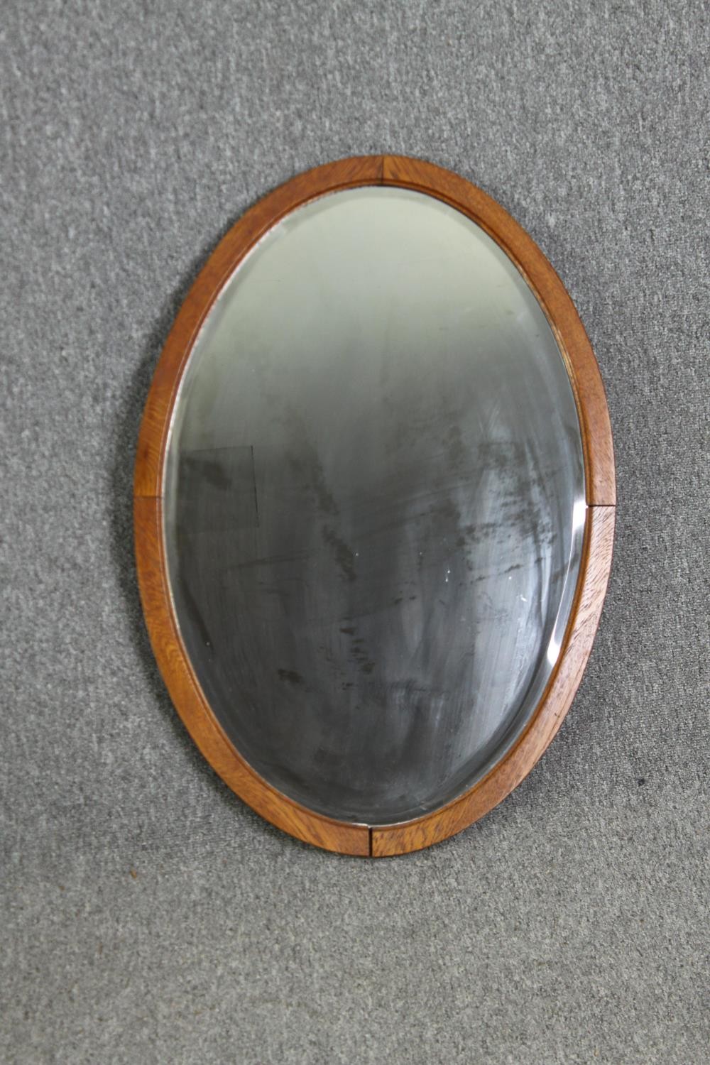 Two oval mirrors, one in oak, the other walnut, with bevelled glass H.95 W.55cm. - Image 2 of 8