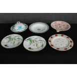 A group of six various 19th century porcelain plates, a cake stand and a cheese dish, including