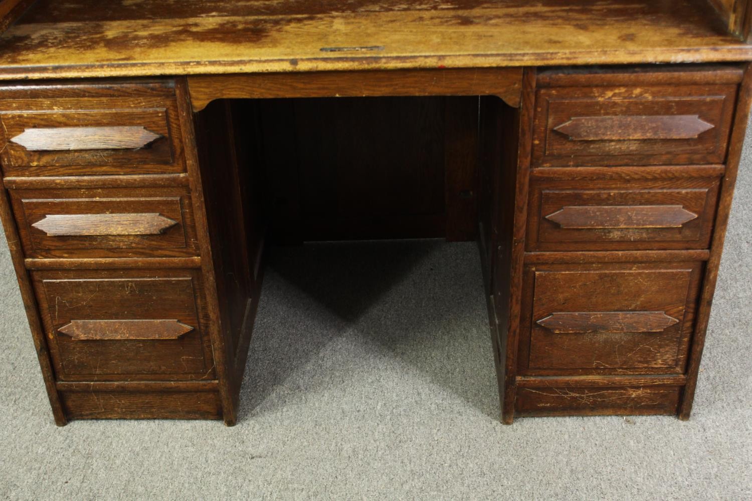 An oak roll top tambour fronted desk, early 20th century with maker's mark. H.128 W.126 D.76cm. - Image 7 of 8