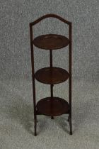 An Edwardian mahogany three tier mahogany cakestand. H.84cm.