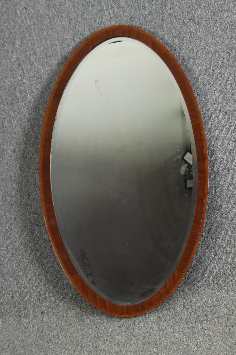 Two oval mirrors, one in oak, the other walnut, with bevelled glass H.95 W.55cm. - Image 3 of 8