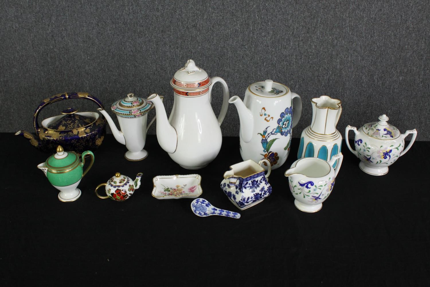 Various china teapots, jugs and other items, including Coalport. H.24cm. (largest).