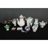 Various china teapots, jugs and other items, including Coalport. H.24cm. (largest).